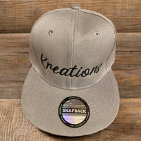 Kreations “Snap back” hats