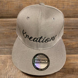 Kreations “Snap back” hats